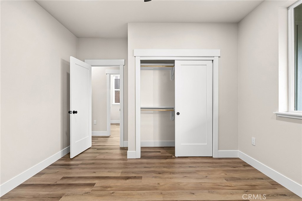 707 Madrone Way Paradise, CA 95969 - Photo 30 of 47 a view of empty room with wooden floor