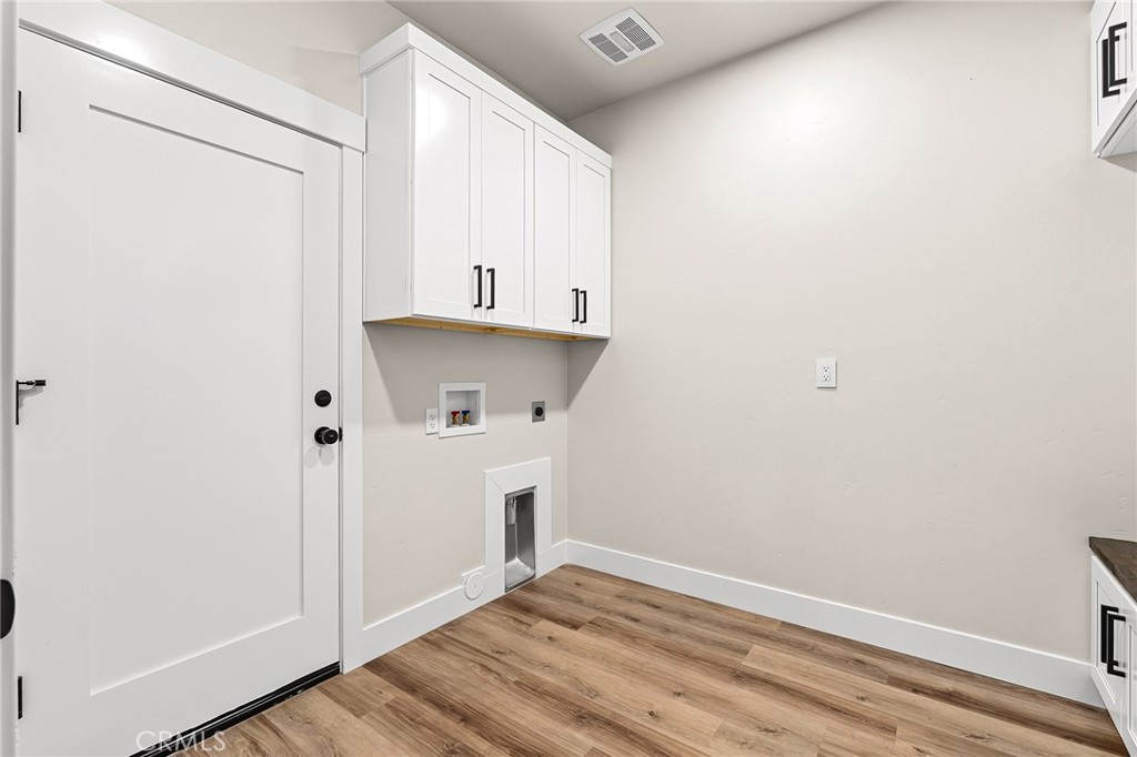 707 Madrone Way Paradise, CA 95969 - Photo 31 of 47 a view of storage and utility room with wooden floor