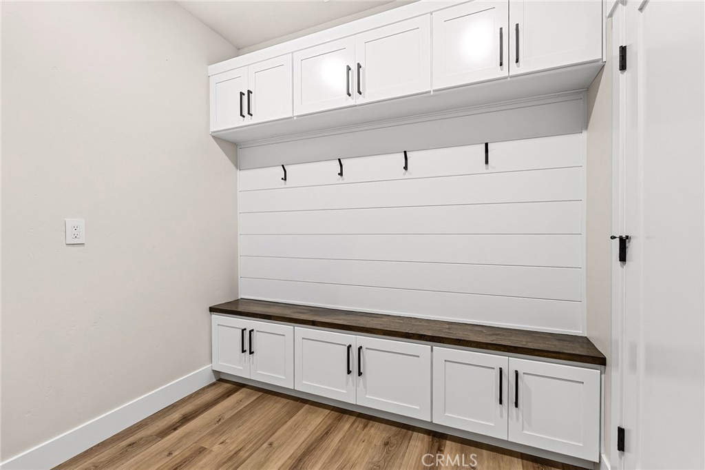 707 Madrone Way Paradise, CA 95969 - Photo 32 of 47 a view of a kitchen with cabinets and wooden floor