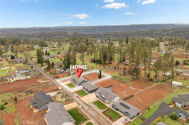 an aerial view of residential building with parking space