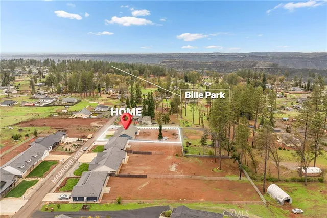 an aerial view of residential building with parking space