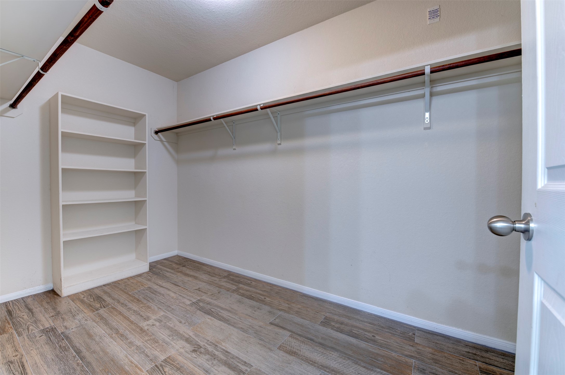 3314 Single Ridge Way Katy, TX 77493 - Photo 16 of 24 Large master bedroom walk-in closet with shelving and plenty of hanging space