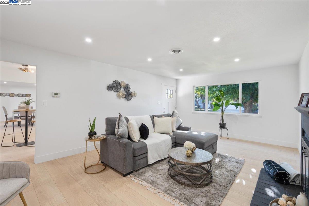 4023 Roland Drive Concord, CA 94521 - Photo 11 of 59 a living room with furniture and a large window