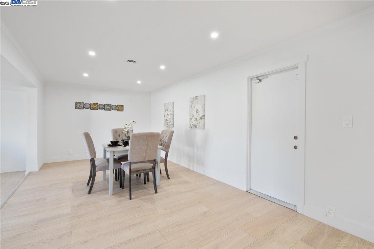 4023 Roland Drive Concord, CA 94521 - Photo 20 of 59 a view of a dining room with furniture and a potted plant