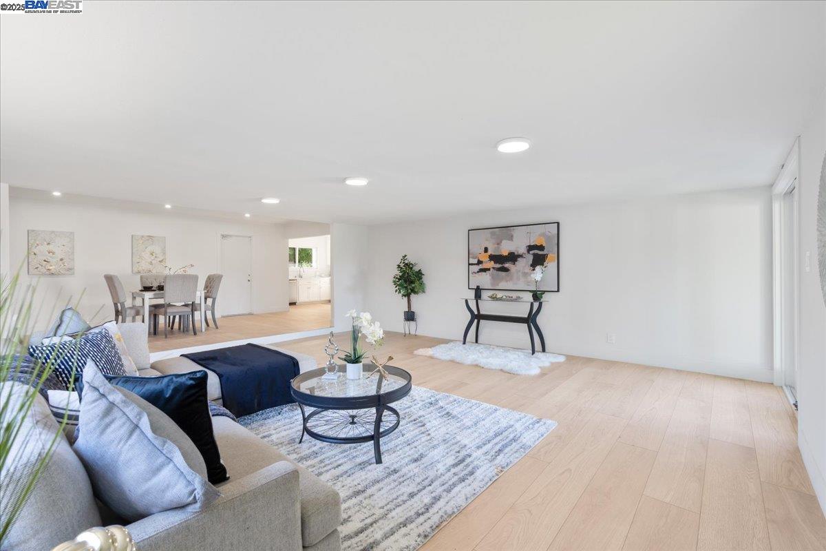 4023 Roland Drive Concord, CA 94521 - Photo 26 of 59 a living room with furniture and wooden floor