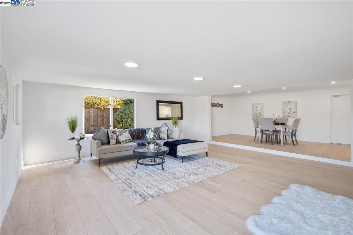 4023 Roland Drive Concord, CA 94521 - Photo 27 of 59 a living room with furniture and a table