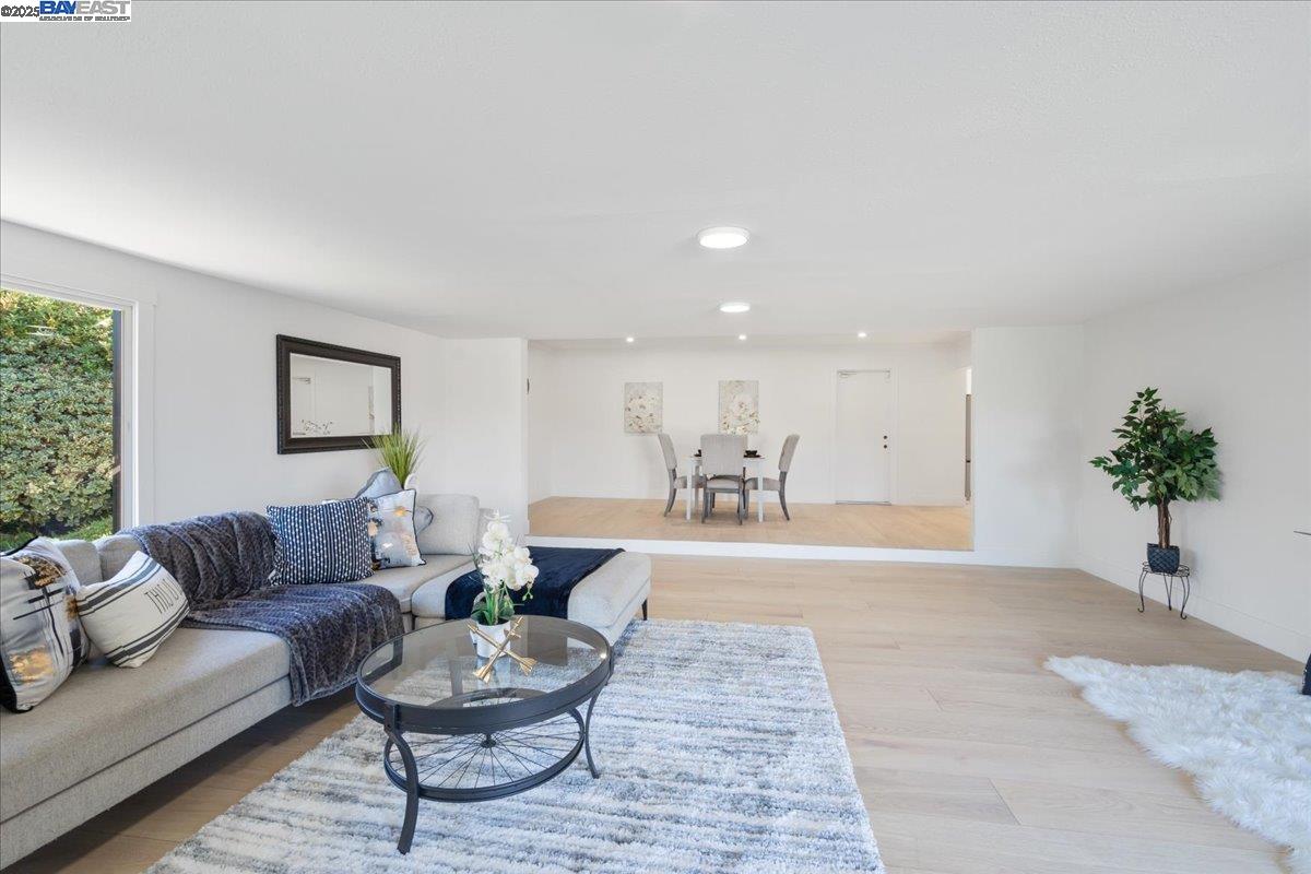 4023 Roland Drive Concord, CA 94521 - Photo 28 of 59 a living room with furniture and a potted plant