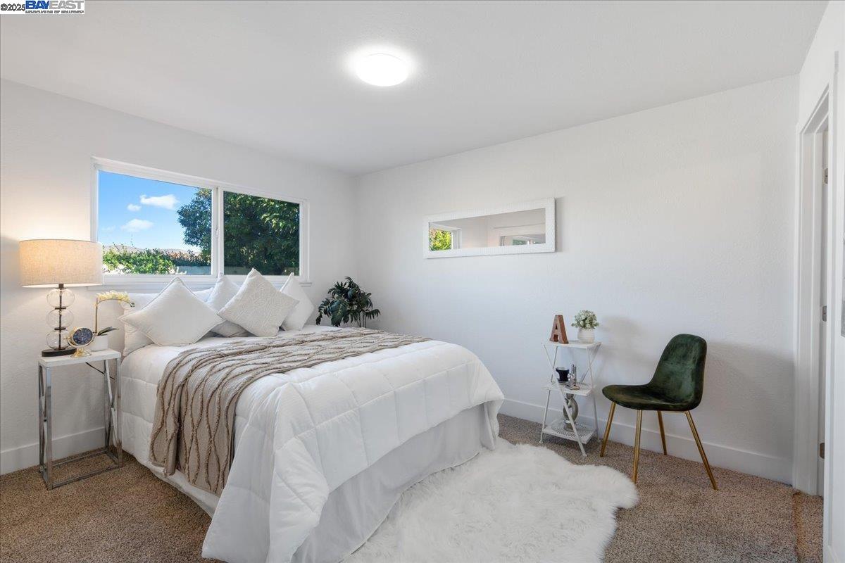 4023 Roland Drive Concord, CA 94521 - Photo 31 of 59 a bedroom with bed and a window