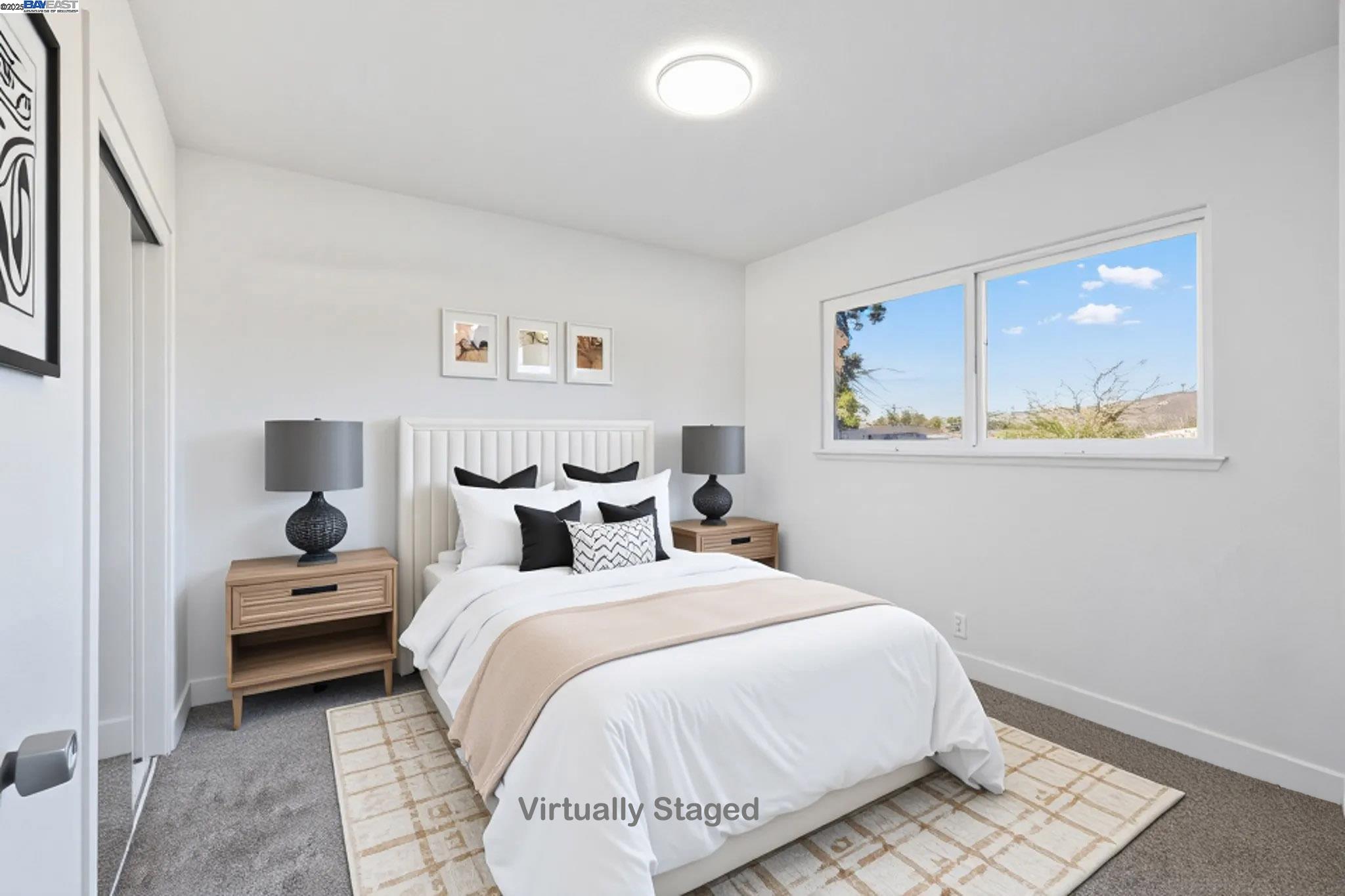 4023 Roland Drive Concord, CA 94521 - Photo 38 of 59 a bedroom with a bed and a painting on the wall