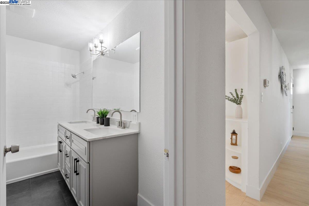 4023 Roland Drive Concord, CA 94521 - Photo 45 of 59 a bathroom with a sink a vanity and a mirror