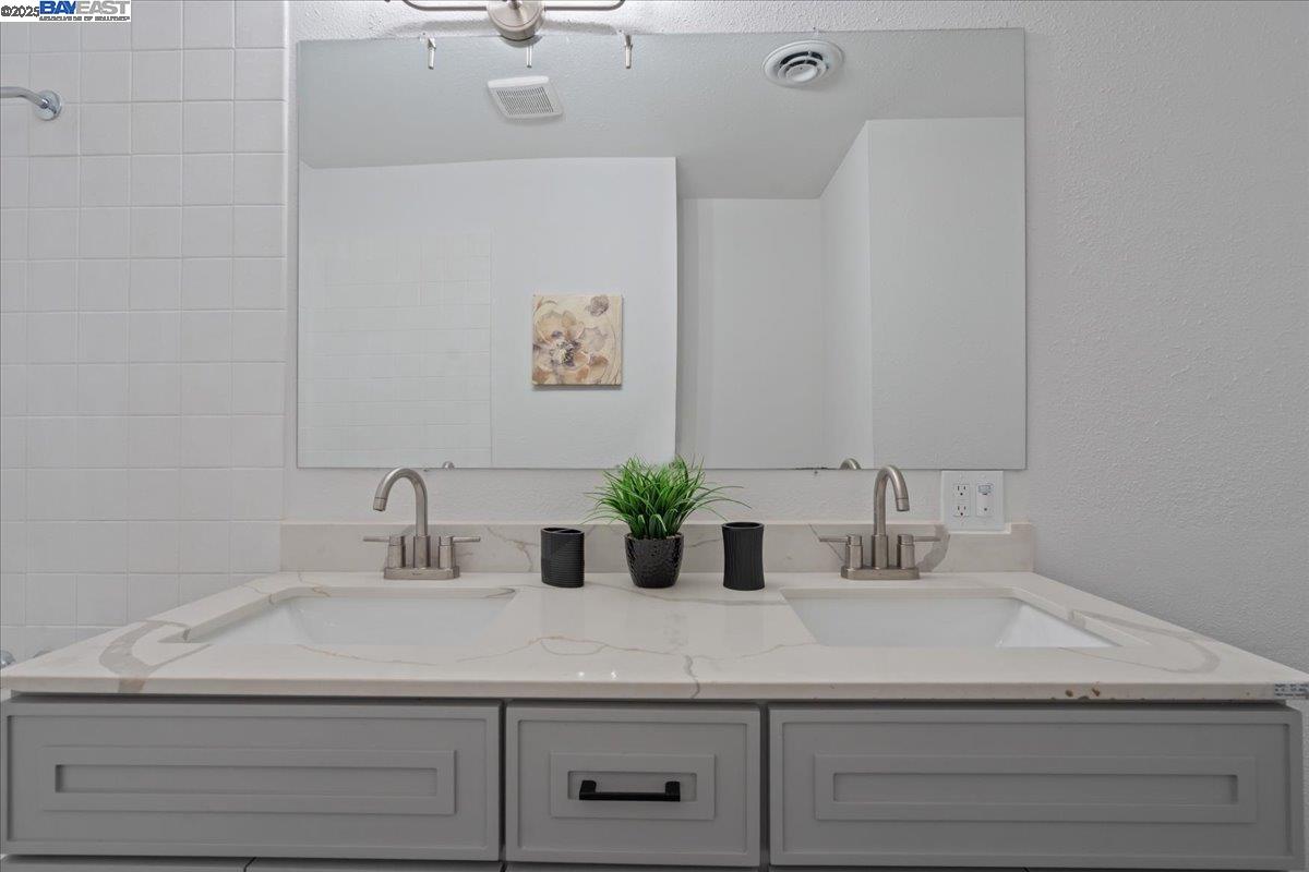 4023 Roland Drive Concord, CA 94521 - Photo 47 of 59 a bathroom with a sink and a mirror