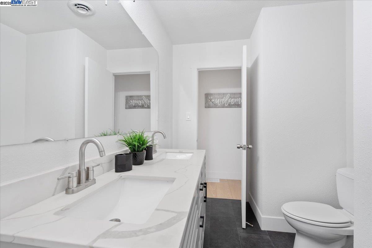 4023 Roland Drive Concord, CA 94521 - Photo 48 of 59 a bathroom with a sink and a toilet