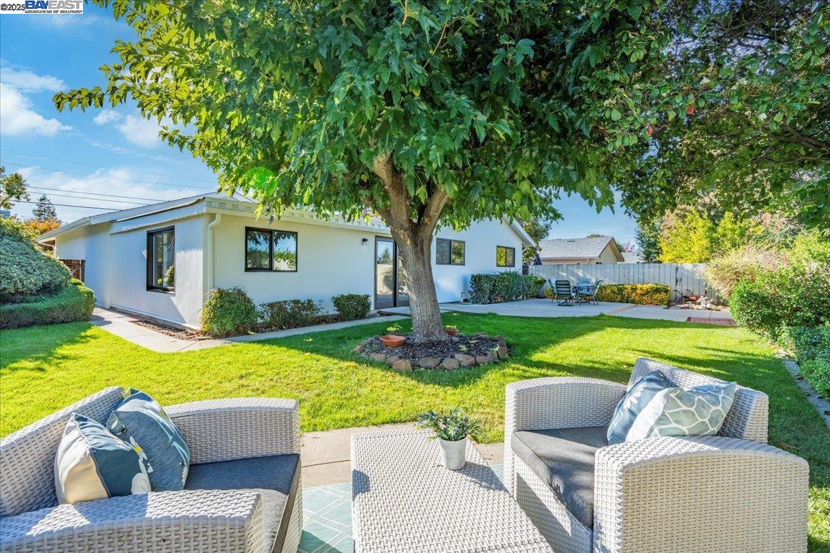 4023 Roland Drive Concord, CA 94521 - Photo 51 of 59 a view of backyard of house with outdoor seating and green space