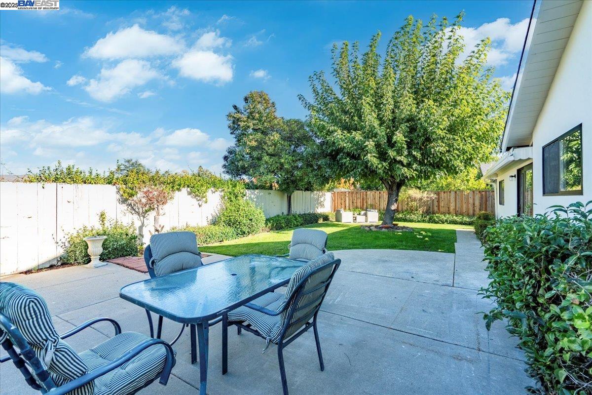 4023 Roland Drive Concord, CA 94521 - Photo 55 of 59 a view of a backyard with table and chairs and a tree