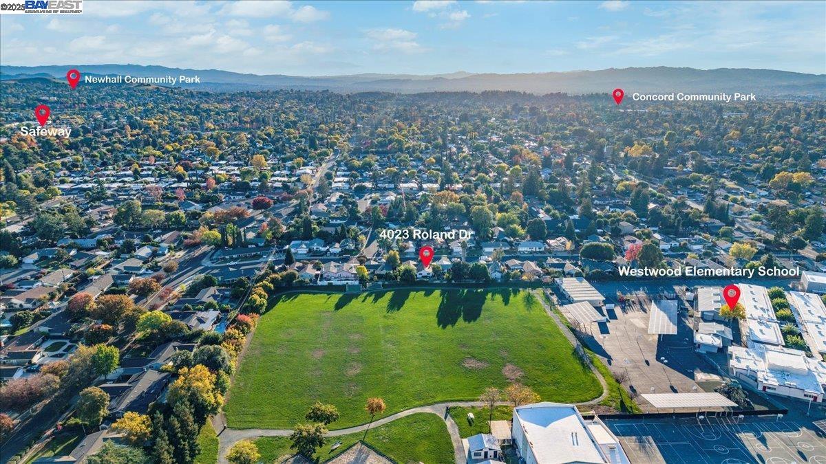 4023 Roland Drive Concord, CA 94521 - Photo 58 of 59 an aerial view of residential houses with outdoor space and trees
