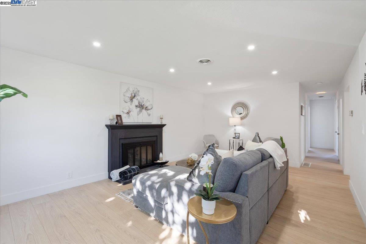 4023 Roland Drive Concord, CA 94521 - Photo 8 of 59 a living room with furniture and a fireplace