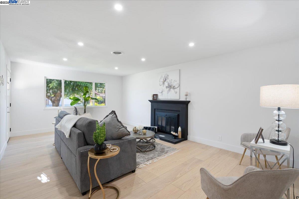 4023 Roland Drive Concord, CA 94521 - Photo 10 of 59 a living room with furniture and a fireplace