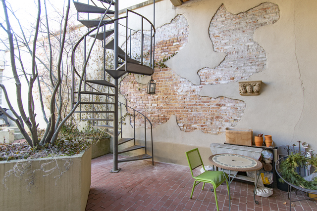 537 Custer Avenue, Unit 5 Evanston, IL 60202 - Photo 19 of 19 a view of a chairs and table in backyard