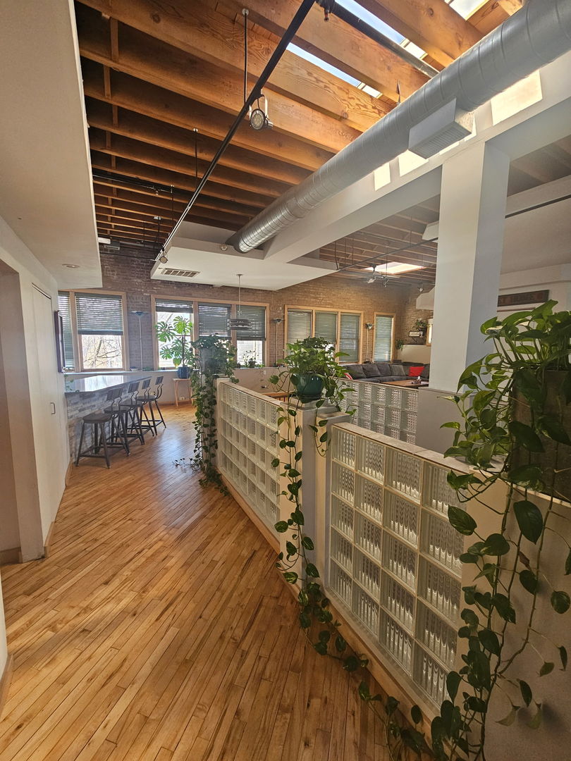 537 Custer Avenue, Unit 5 Evanston, IL 60202 - Photo 5 of 19 a view of entryway with wooden floor