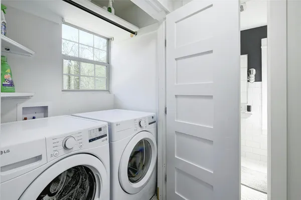 a utility room with dryer and washer