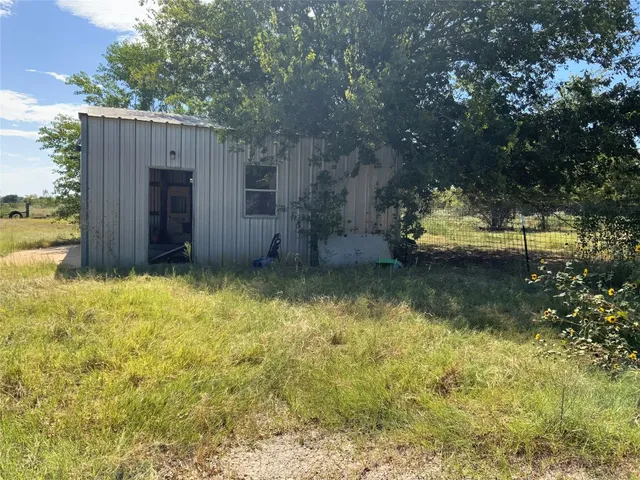 a house view with a outdoor space