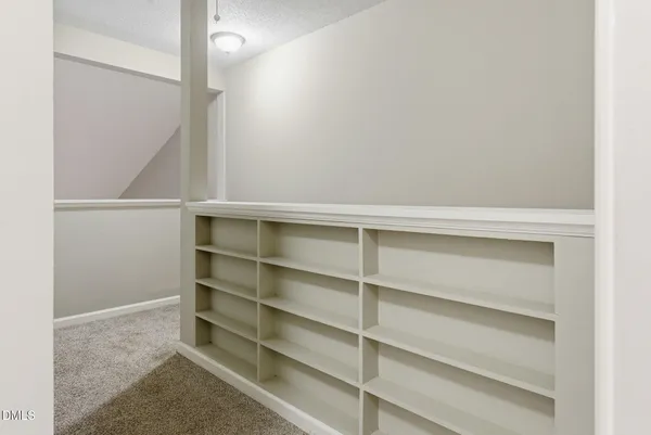 a view of storage and utility room with washer and dryer