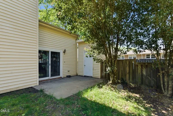 a view of backyard with tree