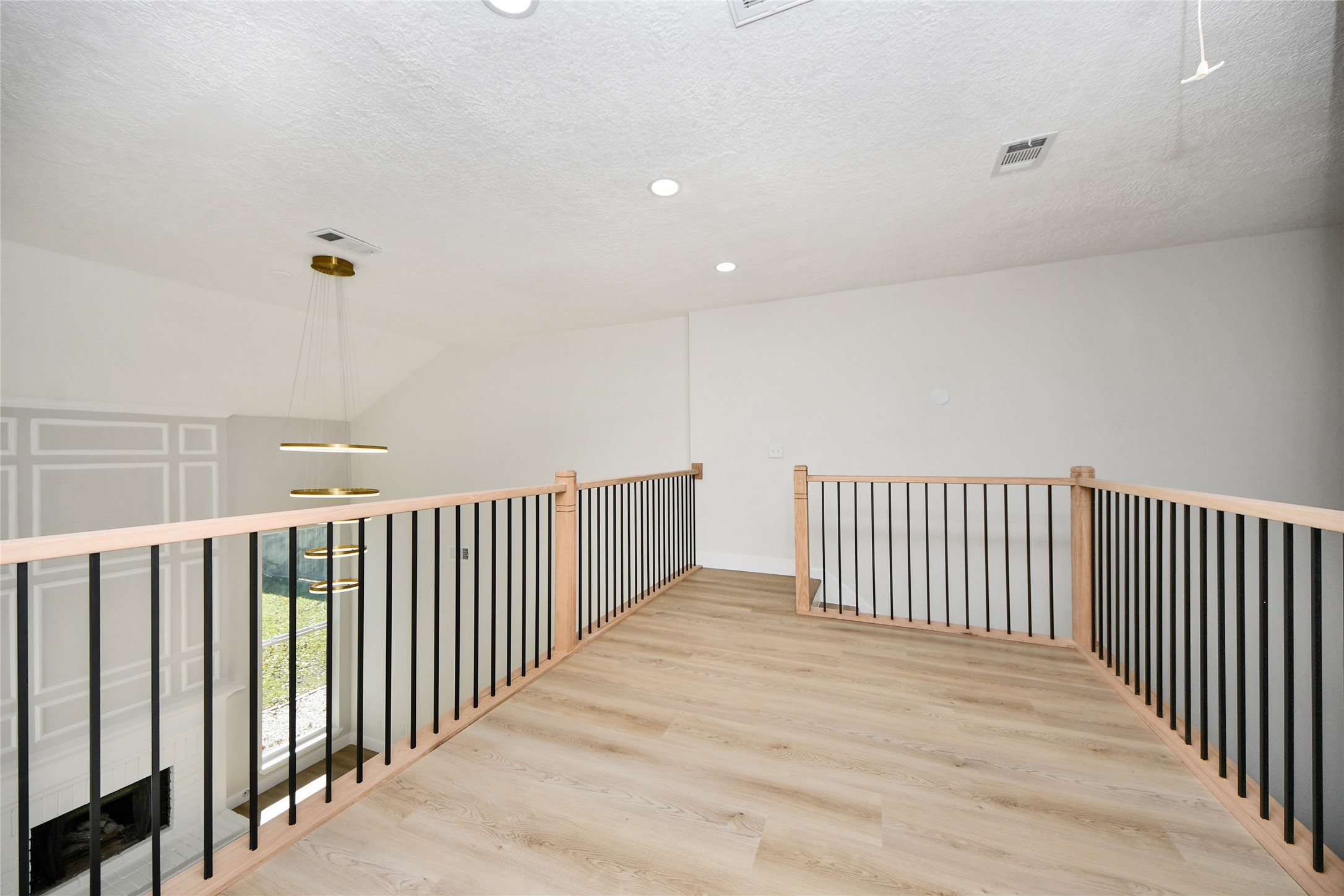 10223 Dude Road Houston, TX 77064 - Photo 30 of 44 a view of a hallway with wooden floor