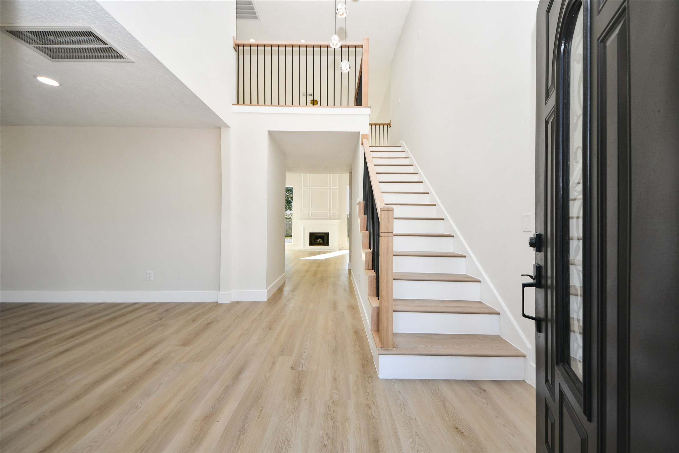 10223 Dude Road Houston, TX 77064 - Photo 4 of 44 a view of a hallway with staircase