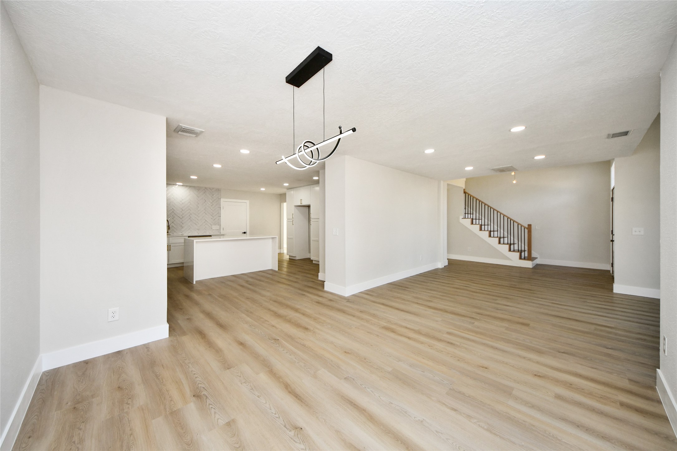 10223 Dude Road Houston, TX 77064 - Photo 8 of 44 a view of a kitchen with a sink and a refrigerator