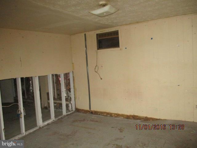 5218 Dogwood Road Gwynn Oak, MD 21207 - Photo 3 of 11 a view of an empty room