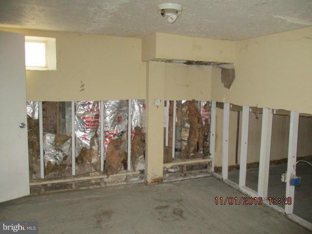5218 Dogwood Road Gwynn Oak, MD 21207 - Photo 4 of 11 a view of a entrance to house with stairs