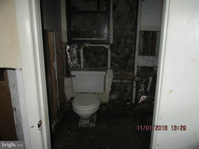 5218 Dogwood Road Gwynn Oak, MD 21207 - Photo 5 of 11 a bathroom with a toilet
