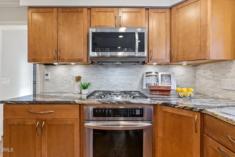 a bath tub sitting in a bathroom next to a window
