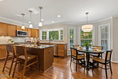a utility room with sink dryer and washer