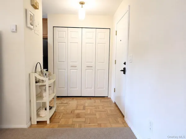 a view of a utility room with closet