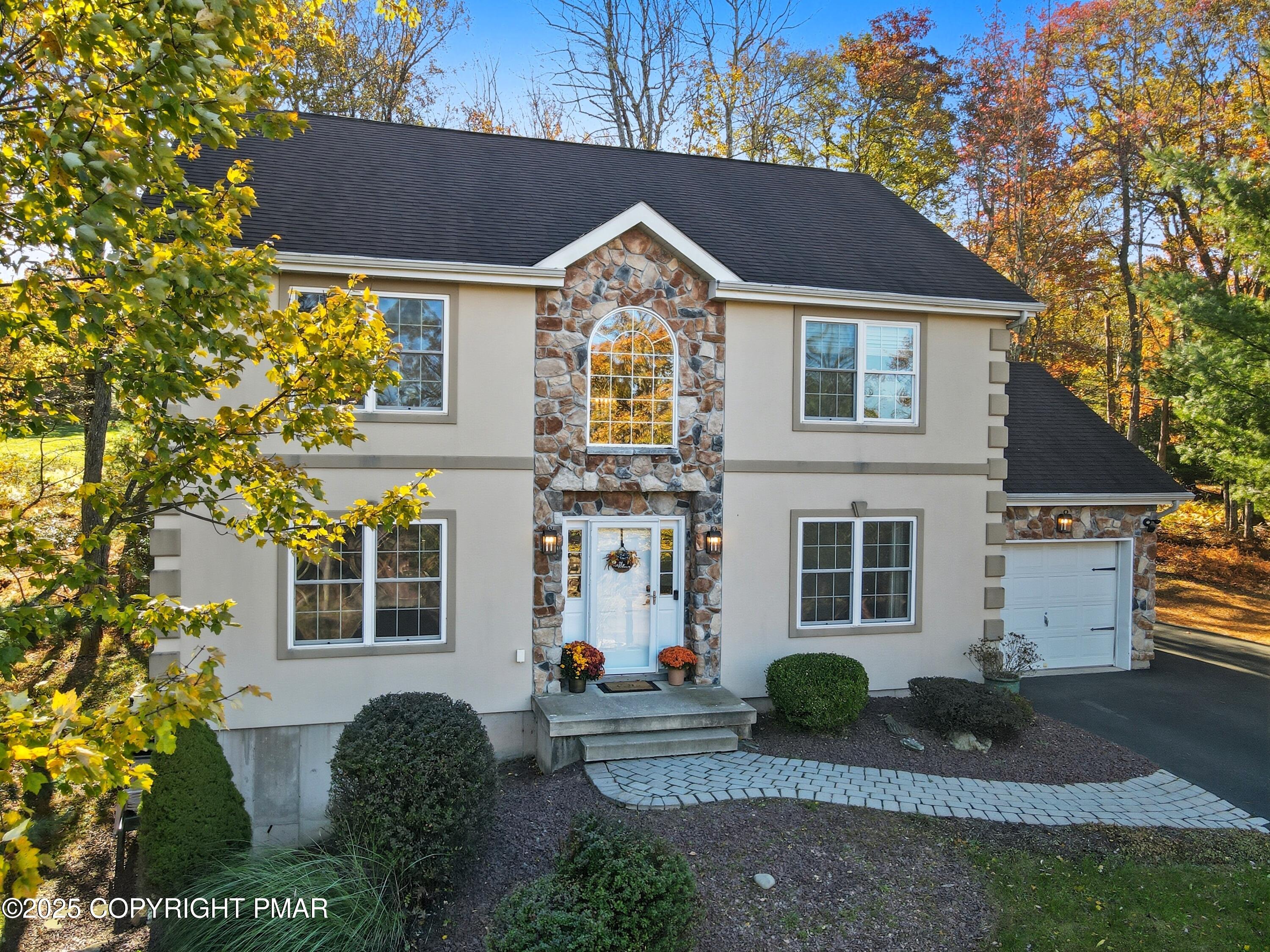 104 Wolf Hollow Road Lake Harmony, PA 18624 - Photo 3 of 101 a house view with a garden space
