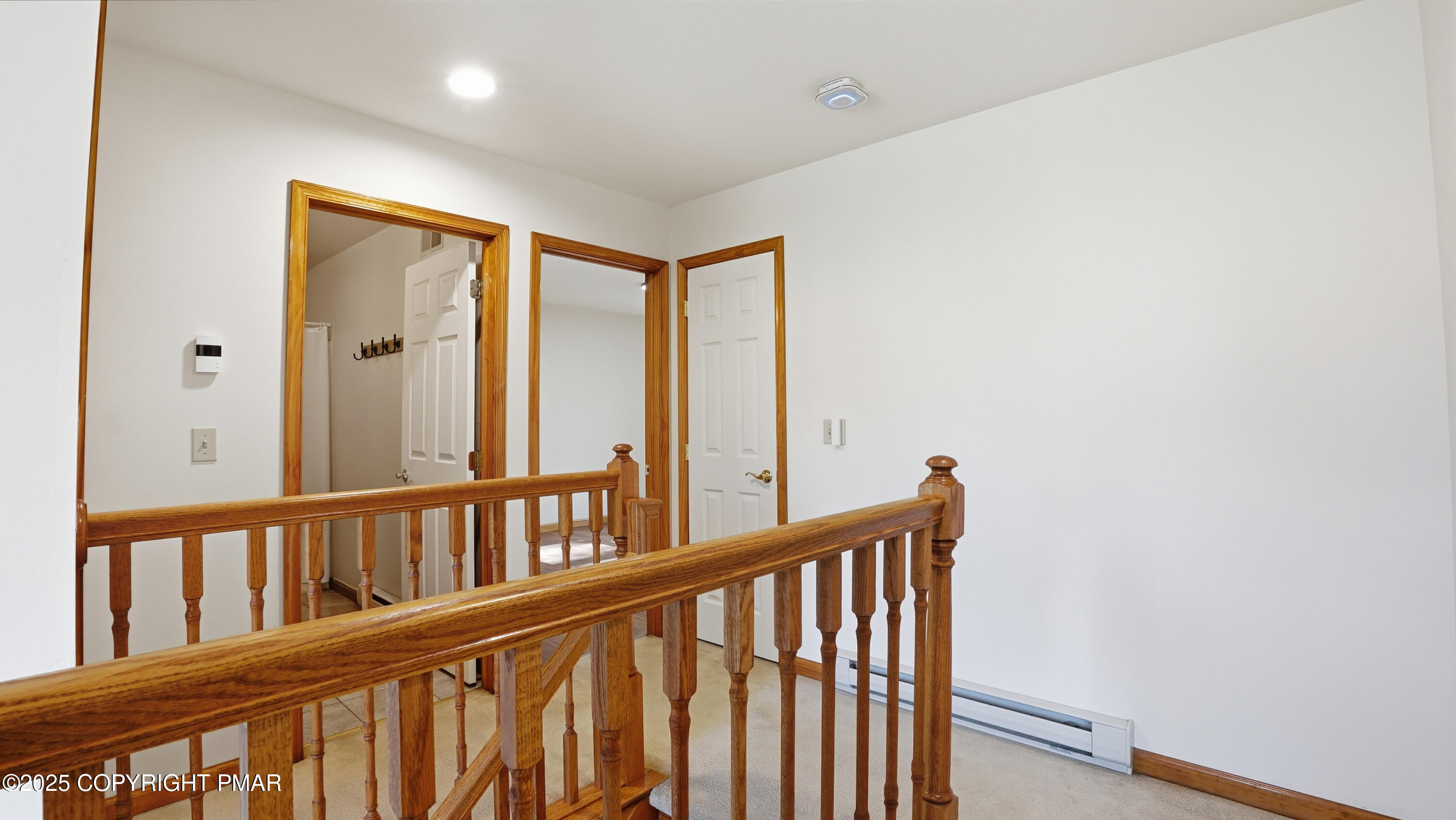 104 Wolf Hollow Road Lake Harmony, PA 18624 - Photo 31 of 101 a view of a hallway with wooden staircase