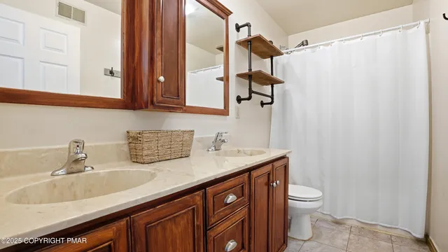 a view of a room with rack on the wall