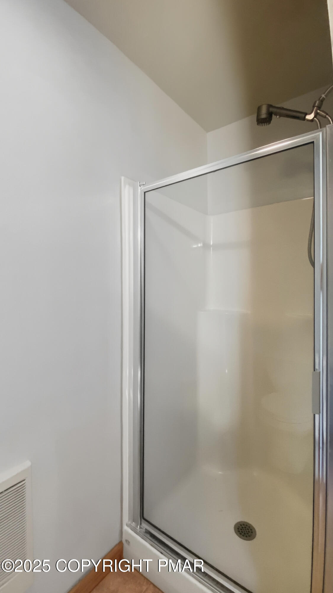 104 Wolf Hollow Road Lake Harmony, PA 18624 - Photo 49 of 101 a bathroom with a glass shower door