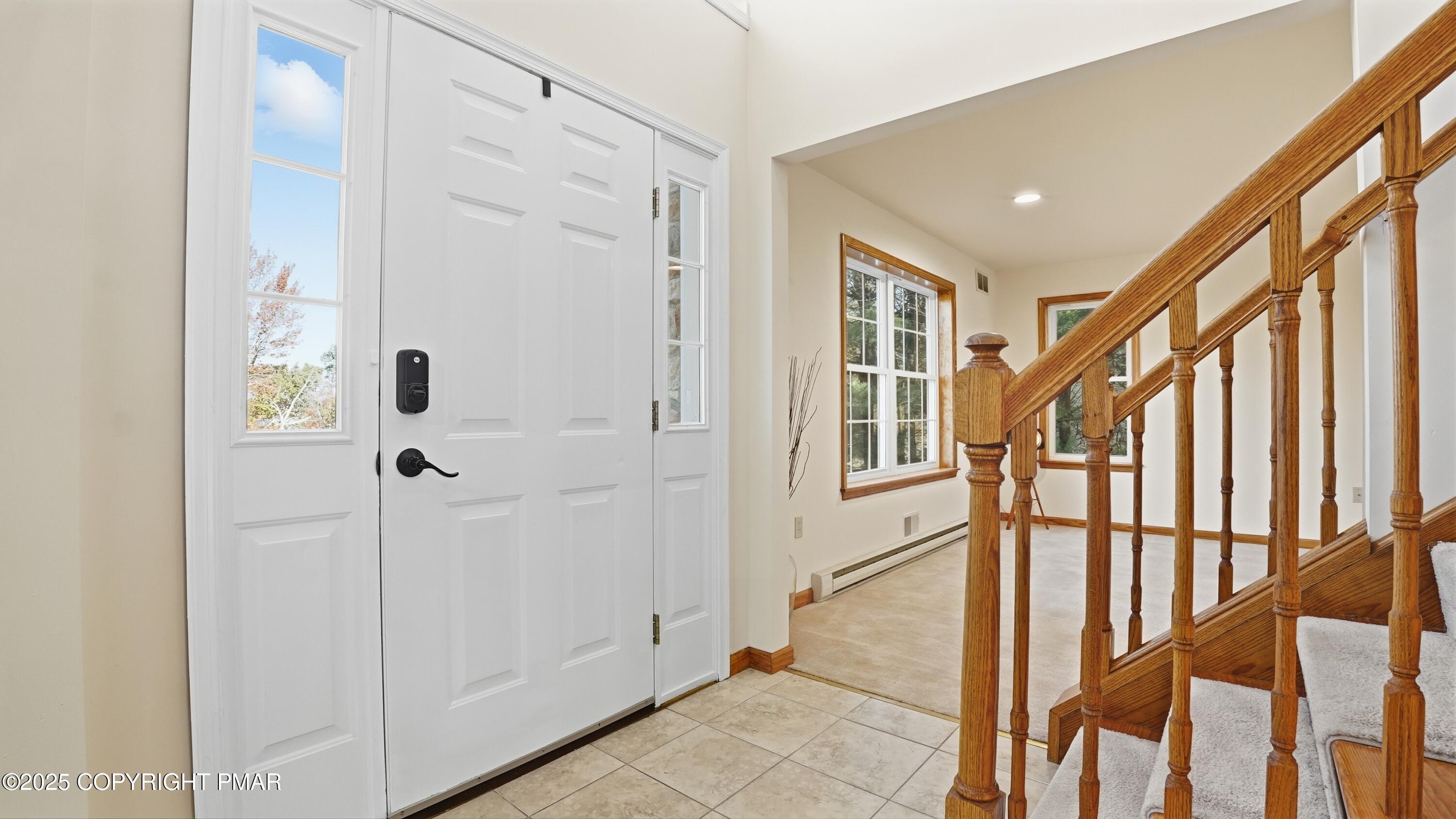 104 Wolf Hollow Road Lake Harmony, PA 18624 - Photo 10 of 101 a view of an entryway with wooden floor