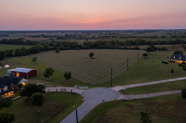a view of a lake with a yard