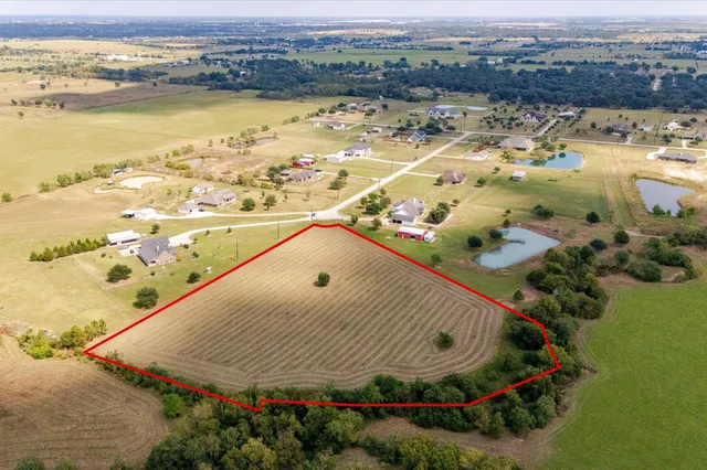 a view of swimming pool with a yard