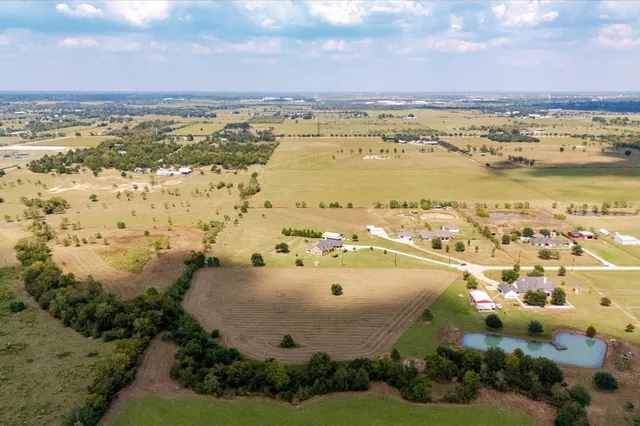 a view of a lake with a big yard