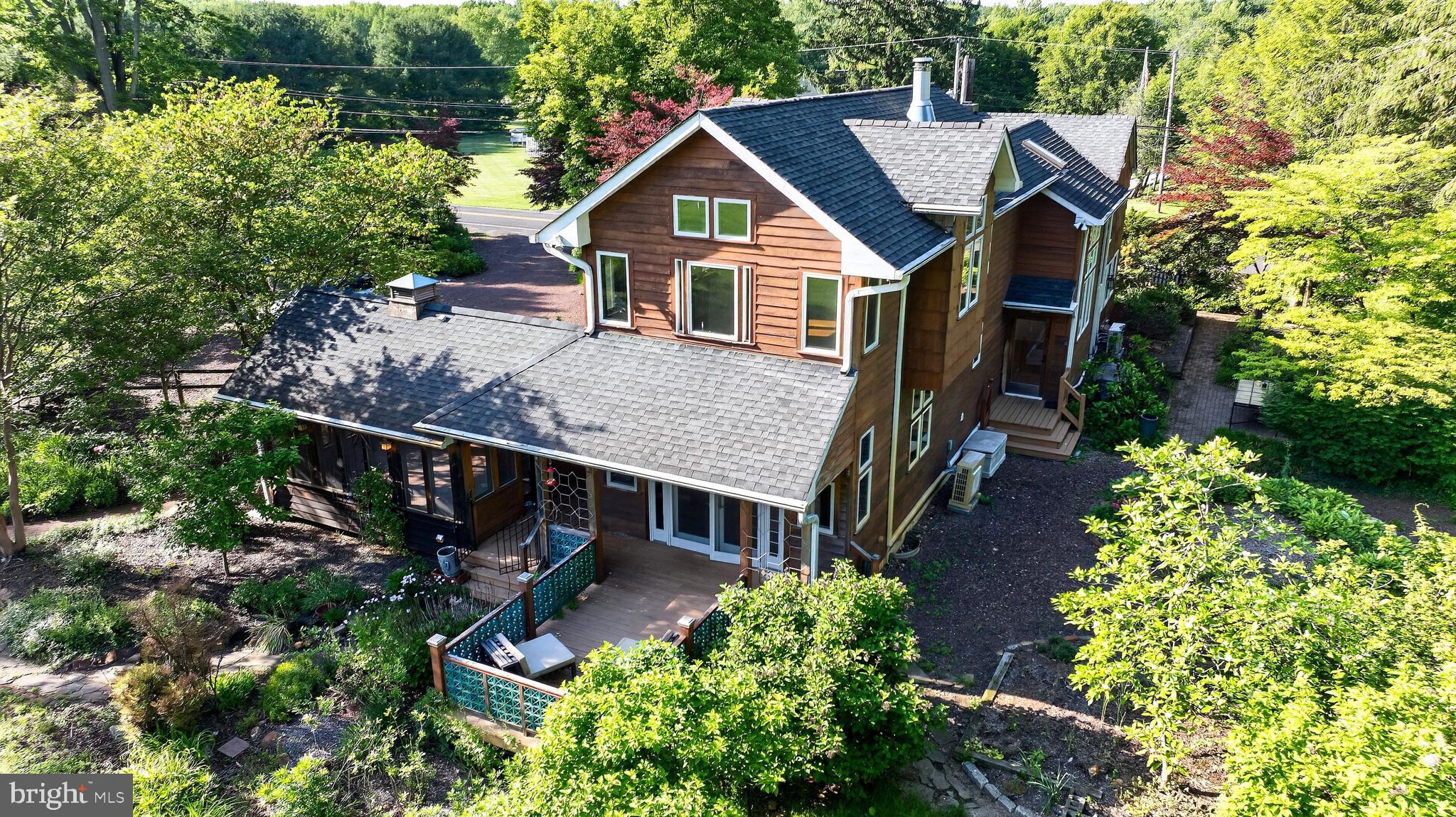 498 Perrineville Road Robbinsville, NJ 08691 - Photo 50 of 59 front view of a house with a small yard