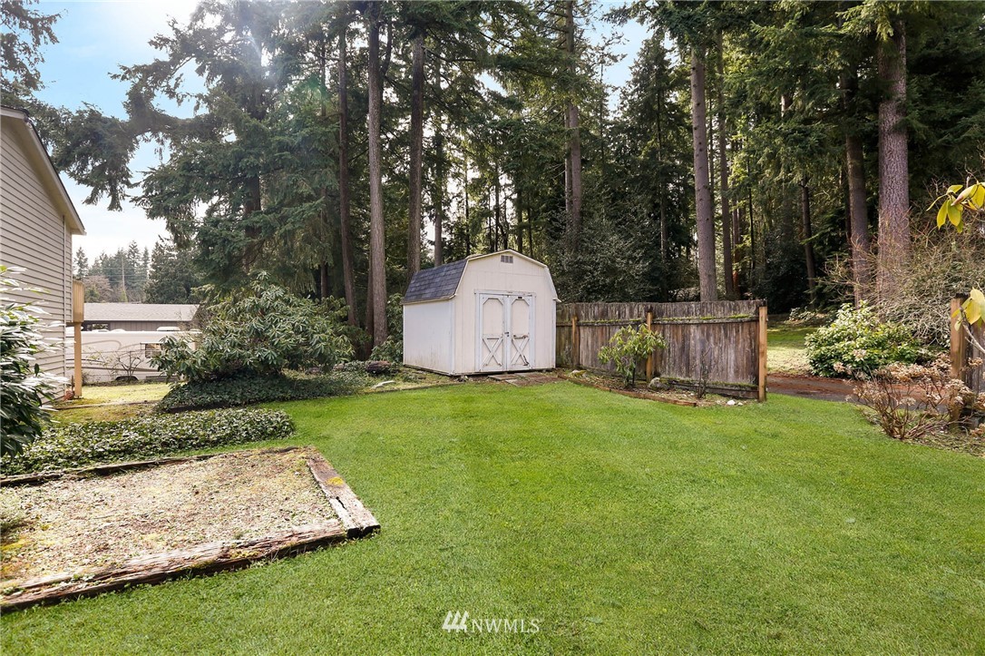 22612 3rd Avenue Southeast Bothell, WA 98021 - Photo 22 of 25 a garden view with a sitting space