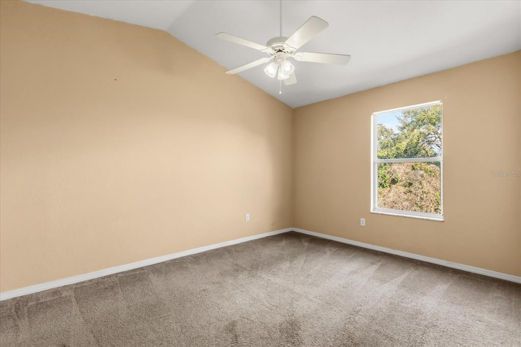 3374 Hamlet Loop Winter Park, FL 32792 - Photo 20 of 37 an empty room with a window