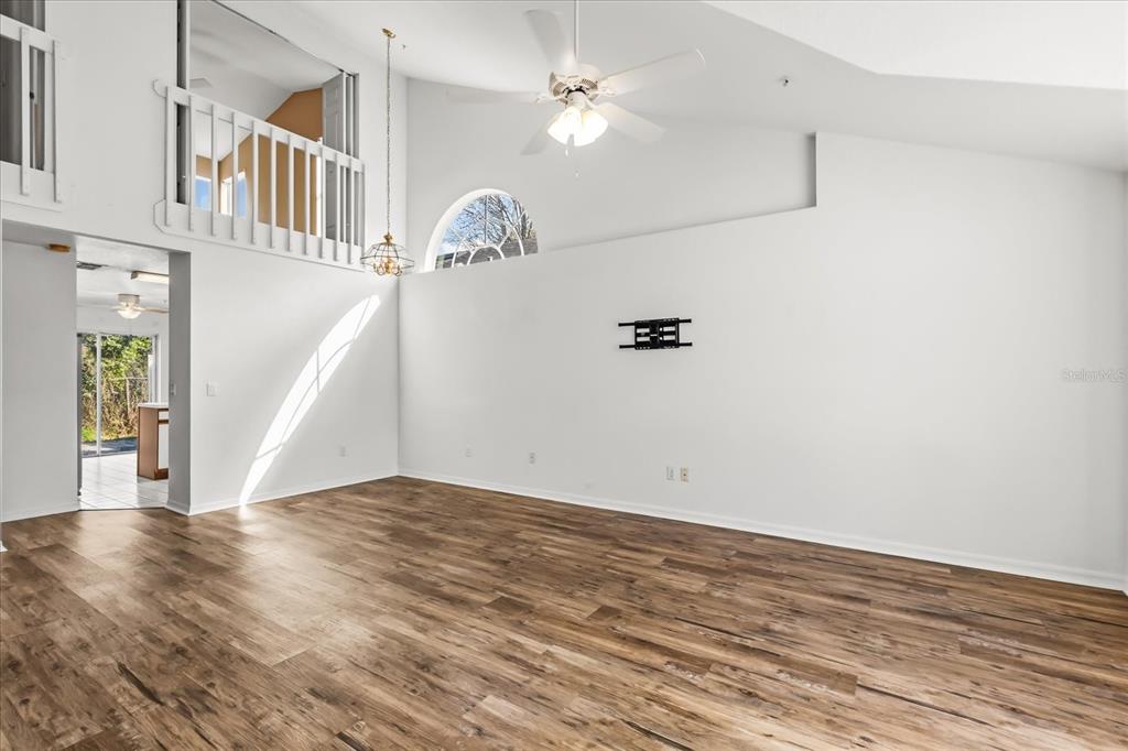3374 Hamlet Loop Winter Park, FL 32792 - Photo 2 of 37 a view of an entryway with wooden floor