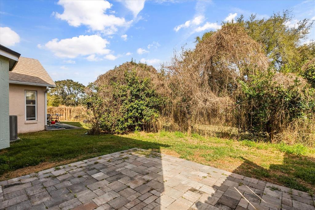 3374 Hamlet Loop Winter Park, FL 32792 - Photo 22 of 37 a view of backyard with green space