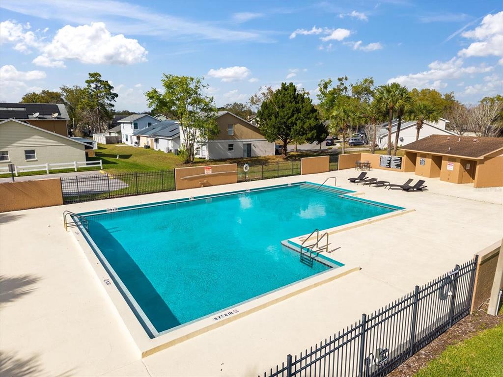 3374 Hamlet Loop Winter Park, FL 32792 - Photo 32 of 37 a view of a swimming pool with chairs